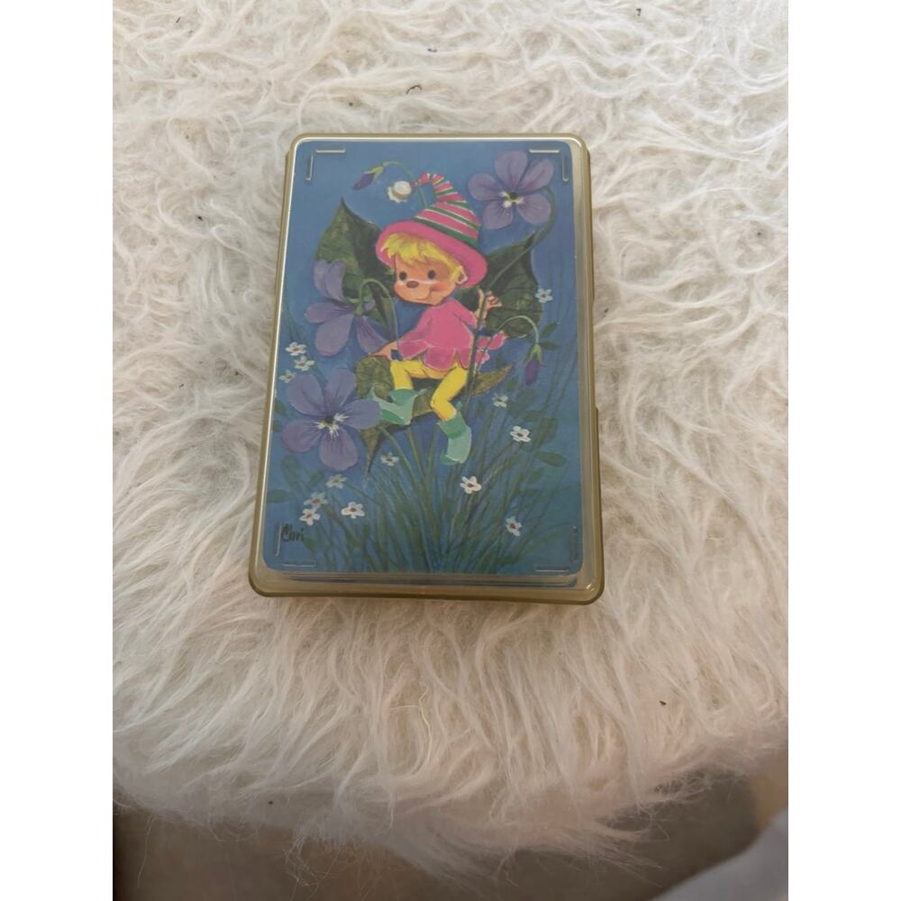 vintage mid-century playing cards featuring a kitsch elf/fairy design
